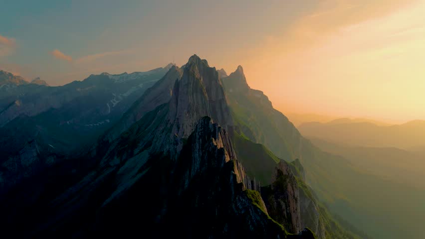 Sunset at Schaeffler mountain ridge swiss Alpstein, Appenzell Switzerland, a steep ridge of the majestic Schaeffler peak, Switzerland.  | Shutterstock HD Video #1099429459
