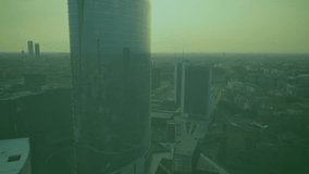 Animation of icons and data processing over cityscape. Global business, finances, computing and data processing concept digitally generated video.