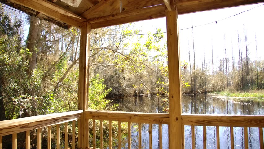 Wooden gazebo overlooking the fishing pond.