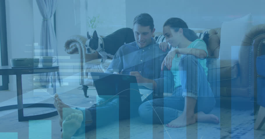 Animation of statistical data processing over caucasian couple using laptop together at home. Global networking and business data technology concept