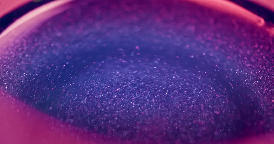 Glitter swirl. Bokeh neon glow. Galaxy nebula. Defocused blue magenta pink color sparkles light vortex lens flare bright abstract background for intro. Shot on RED Cinema camera. | Shutterstock HD Video #1099452041