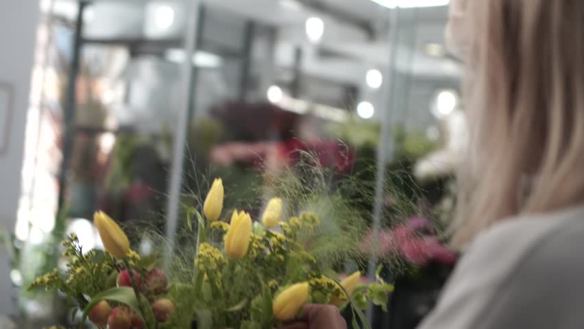 Florist in the flower shop | Shutterstock HD Video #1099455191