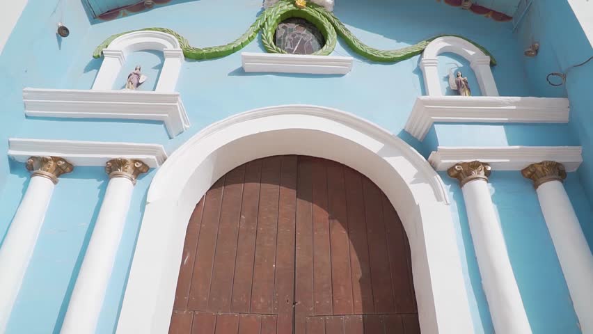 Lady Wearing Mexican Hat Standing In Front Of Main Door Church, Obrajillo