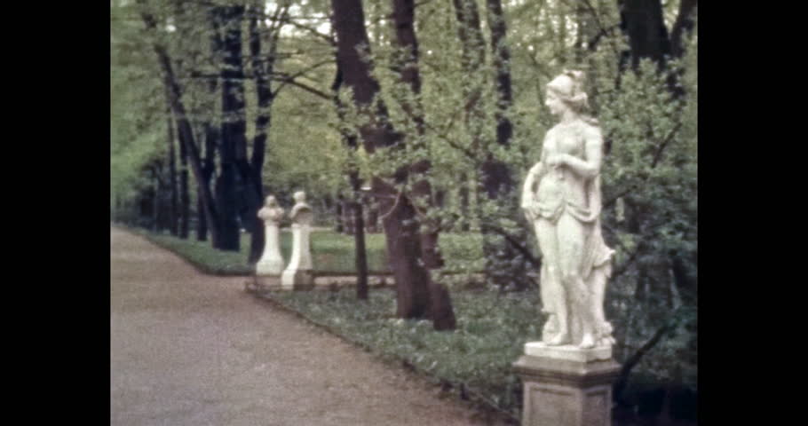 Summer park with marble sculptures. 1980s Petersburg, Russia. Beautiful city park in green trees, walking paths. Summer garden. Old archives. archival color film. Retro, historic archive. No people | Shutterstock HD Video #1099460899