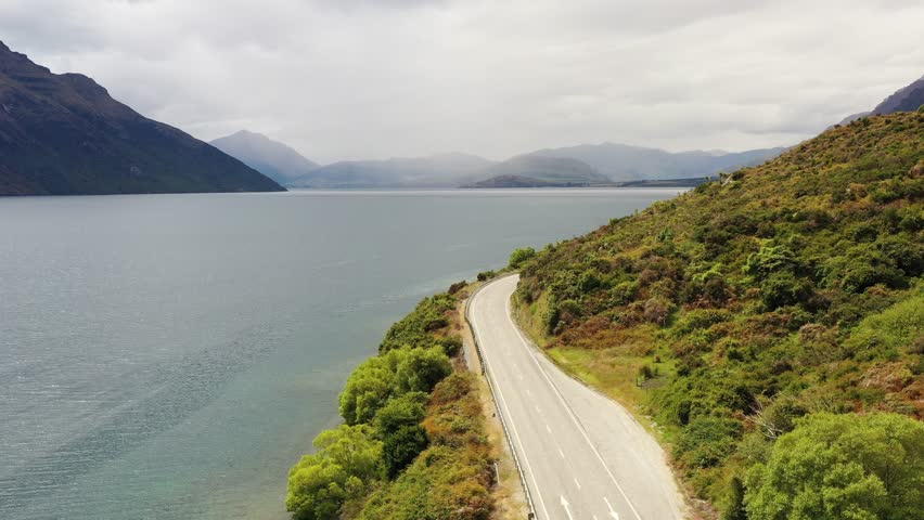 Wakatipu lake in New Zealand along Highway 6 in aerial 4k flying.
 | Shutterstock HD Video #1099466419