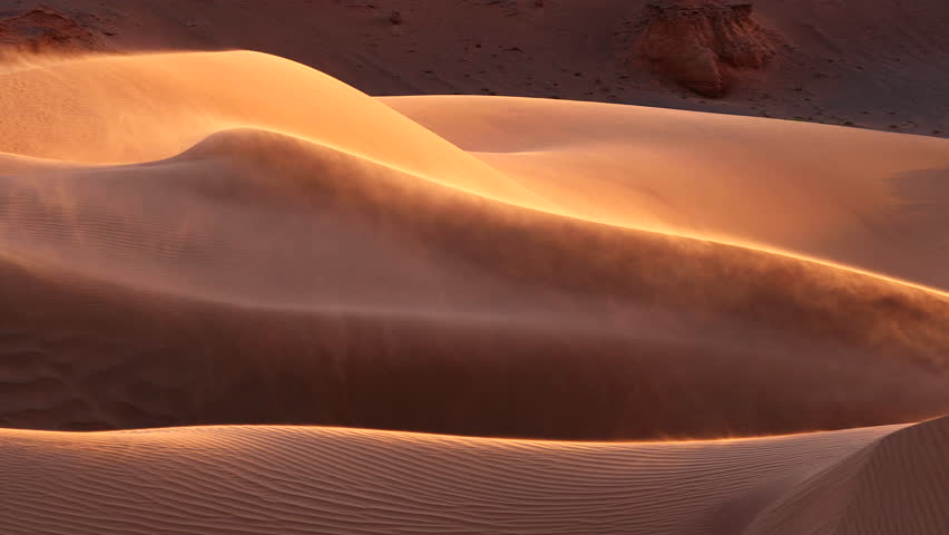 Sand blowing over dunes in wind, sandstorm in Gobi desert, Mongolia | Shutterstock HD Video #1099470981