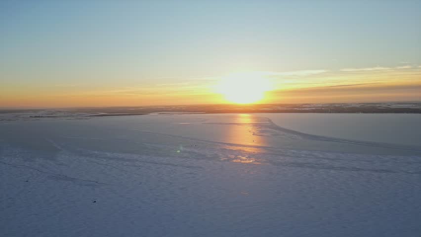 Golden hour by the Great Lakes during winter time and sunset