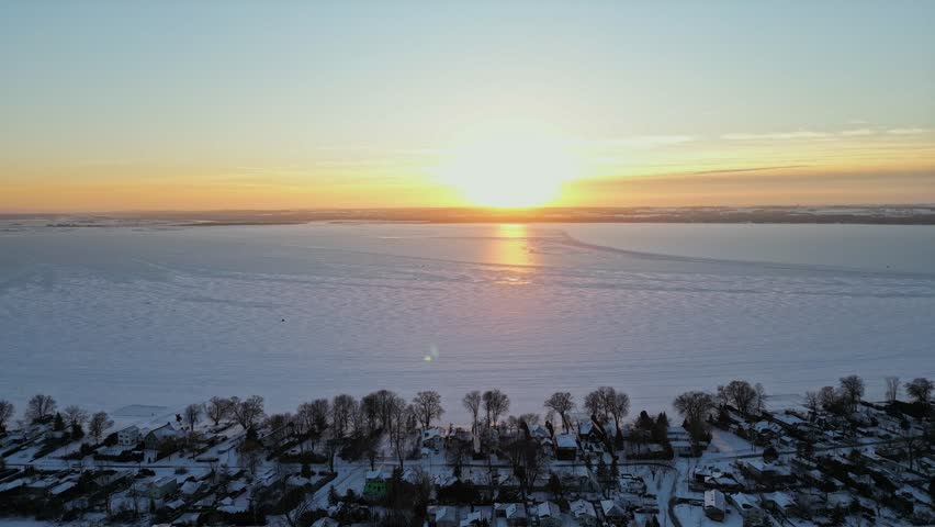 Golden hour by the Great Lakes during winter time and sunset