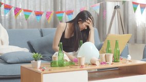 Drunk Asian Woman Wakes Up After Sleeping On A Sofa And Holding Her Head With Hands Due To Having A Headache In The Party Room At Home
 - Powered by Shutterstock - Get 15% off with code: PIKWIZARD15