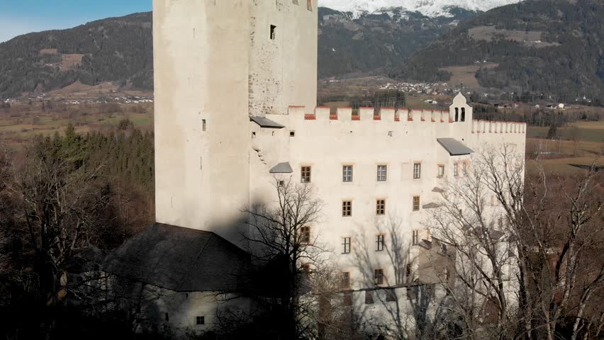 Lienz Castle aerial view in winter, Austria