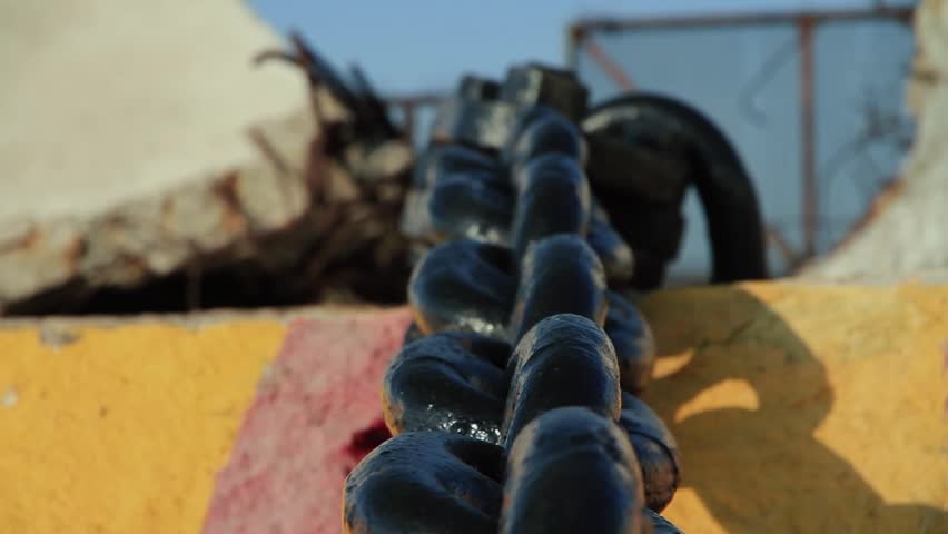 An anchoring device in the form of a large ship