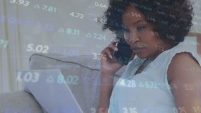 Animation of financial data processing over businesswoman using smartphone. Global business, finances, computing and data processing concept digitally generated video. - Powered by Shutterstock - Get 15% off with code: PIKWIZARD15