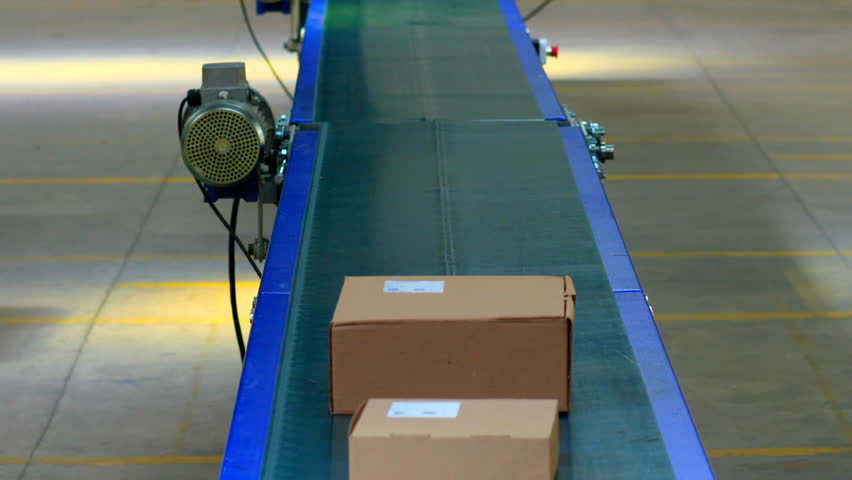 Conveyor belt with many cardboard boxes for delivery to be shipped | Shutterstock HD Video #1099500357