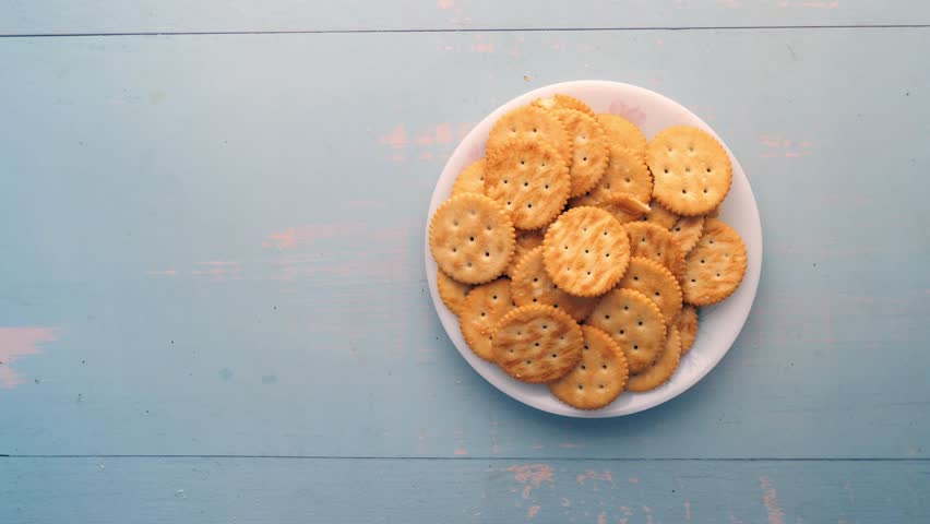 hand pick sweet cookies on wooden table  | Shutterstock HD Video #1099501605
