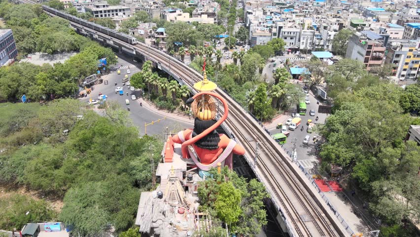 An Aerial Shot of Hanuman statue and Delhi Metro at Jhandewalah, New Delhi,India
 | Shutterstock HD Video #1099502129