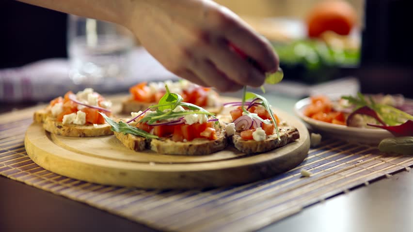 Tasty Tapas On Serving Board Antipasti Brunch. Delicious Tapas ,Cheese ,Tomatoes. Spanish Restaurant Traditional Food. Appetizer Homemade Antipasto. Catering Mediterranean Food Spanish Tapas Starter  | Shutterstock HD Video #1099502361