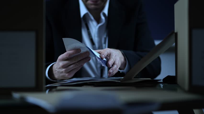 Police Inspector Looking Through Case Files, Murder Investigation Royalty-Free Stock Footage #1099517799