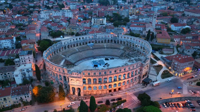 Pula ancient amphitheater, aerial view of famous tourist landmark in Croatia colosseum in Pula, unesco heritage site in Croatia | Shutterstock HD Video #1099536687