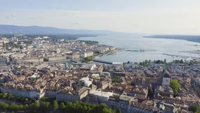 Inscription on video. Geneva, Switzerland. Flight over the central part of the city. Lake Geneva. Text furry, Aerial View