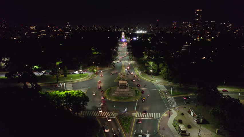 Aerial view of the Urquiza Monument at night with the main avenue with constant car traffic, Palermo, Buenos Aires, Argentina.