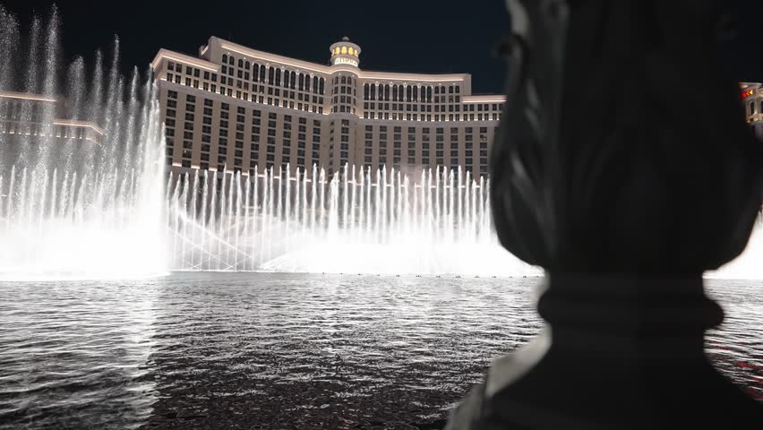 Bellagio water fountains in Las Vegas Nevada. Water show in Las Vegas at night at the Bellagio hotel casino. Slow motion water fountain on Las Vegas strip.