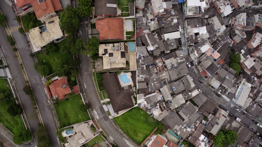 Aerial view of Class distinction in Brazil, A wall separating the rich from the poor in Sao Paulo Royalty-Free Stock Footage #1099545015