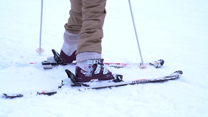 Sky. detail of legs on skis. 4k video. | Shutterstock HD Video #1099547739