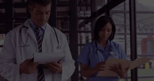 Animation of financial data processing over diverse doctors. Global medicine, healthcare, business, finances, computing and data processing concept digitally generated video.