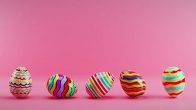 Multicolored Easter eggs rolling on a red background. Loop animation. 3D Illustration - Powered by Shutterstock - Get 15% off with code: PIKWIZARD15