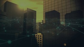 Animation of network of connections with icons over cityscape. Global business, finances, computing and data processing concept digitally generated video.