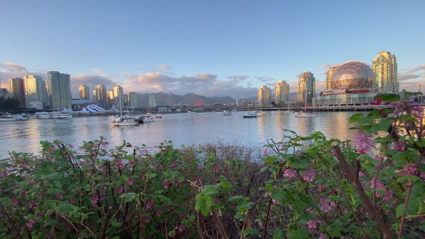 scenic sunset over Science World centre ASTC Science World Society in Vancouver, British Columbia, Canada. amazing landscape with skyline of the city 