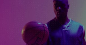 Animation of shapes and light trails over basketball player on neon background. Sports and communication concept digitally generated video.