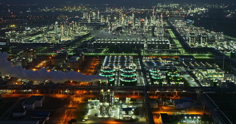 Aerial view of oil and gas petrochemical industrial with Refinery factory scene at night Royalty-Free Stock Footage #1099568903