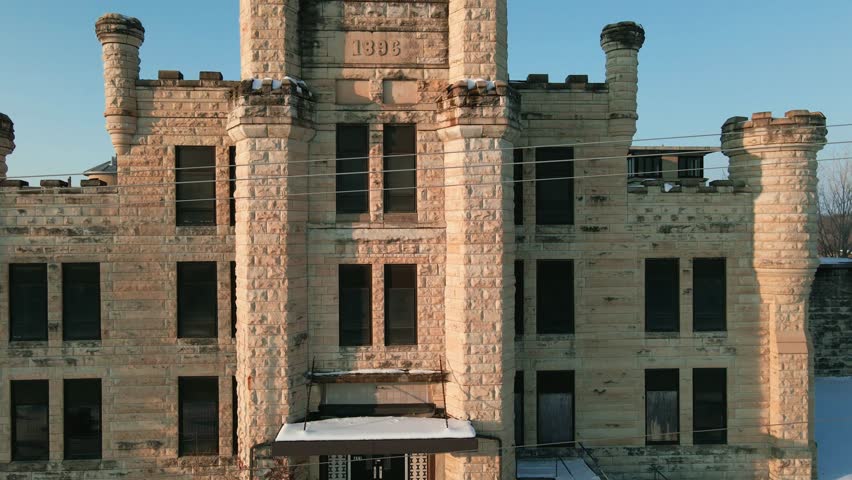 Old prison in Joliet, Illinois famous for prison break tv series and blues brothers. Drone shot rising.