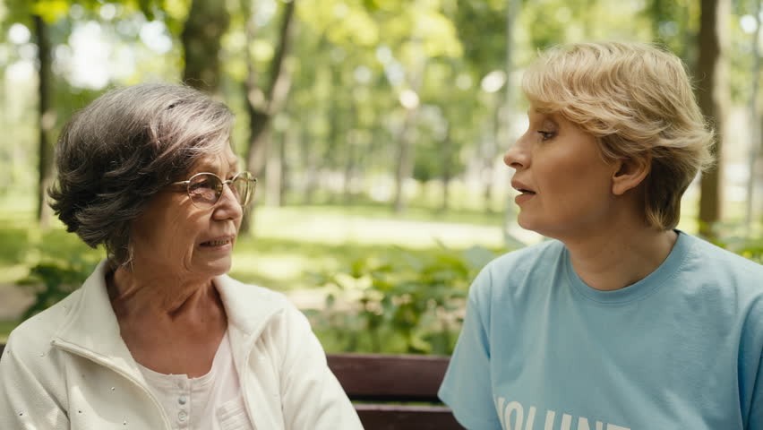 Closeup of senior woman sharing her problems with social services worker | Shutterstock HD Video #1099582763