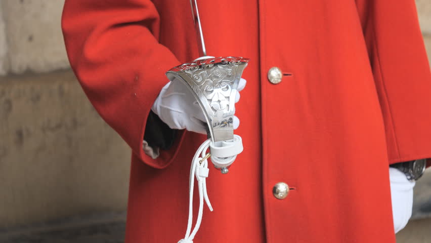 A view of a British army’s household cavalry member holding a sword.