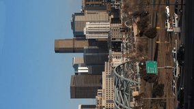 Vertical Video Denver Skyline with Evening Highway Traffic - Powered by Shutterstock - Get 15% off with code: PIKWIZARD15