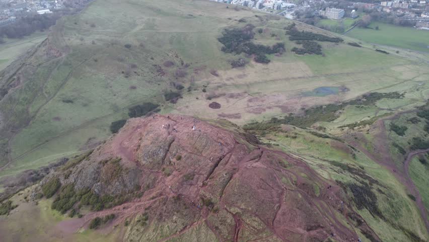 Scenic Drone Aerial Footage of Edinburgh, Scotland, including castle, Arthur