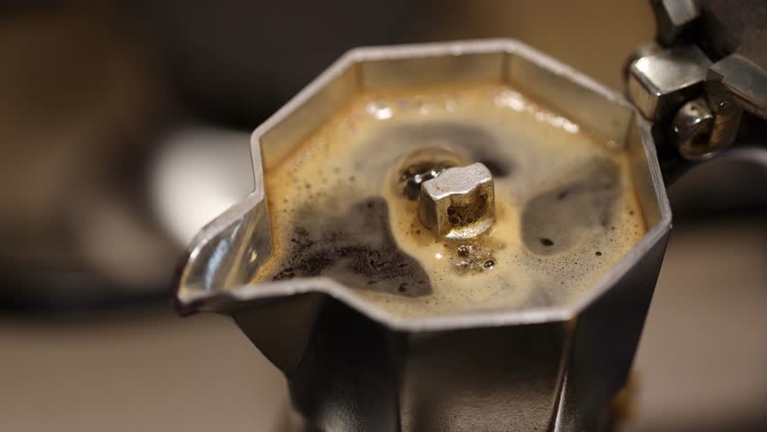 Slow motion steaming Moka Pot brewing coffee. Italian espresso maker | Shutterstock HD Video #1099593269