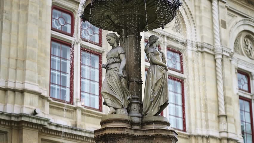 Fountain in front of the Vienna Opera House, Austria. Historic venue for classical opera, ballets, music theater and concerts.