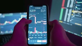 Cryptocurrency charts on mobile phone and computer monitor. - Powered by Shutterstock - Get 15% off with code: PIKWIZARD15