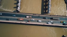 Areal View of vehicles passing on a bridge