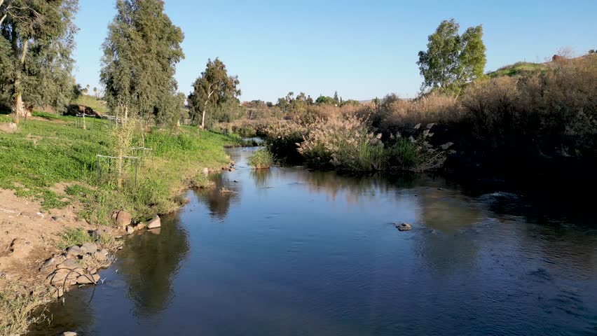 Lash green during the winter- the Jordan river- Yardenit baptism holy Christian site- Religious tourism- Northern Israel