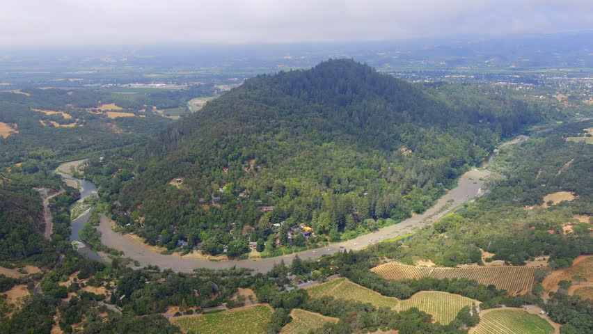 Healdsburg Del Rio woods regional park aerial view reversing reveal overlooking lush green Napa valley landscape