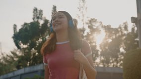 Go green city life net zero waste carry reuse mesh tote bag. Save the earth no plastic free at eco grocer store reduce trash ecology care Gen Z asia young people happy smile walk in nature sun light. - Powered by Shutterstock - Get 15% off with code: PIKWIZARD15