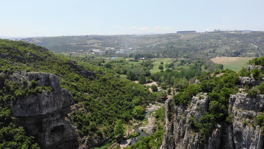 stream river cliff mountain forest