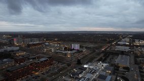 Aerial Footage of Central Milton Keynes City of England Just after Sunset and During Cloudy Evening. Illuminated Buildings and Roads Footage Captured with Drone's Camera on 28-01-2023. 