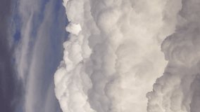 Vertical Video Exploding Cumulus Clouds