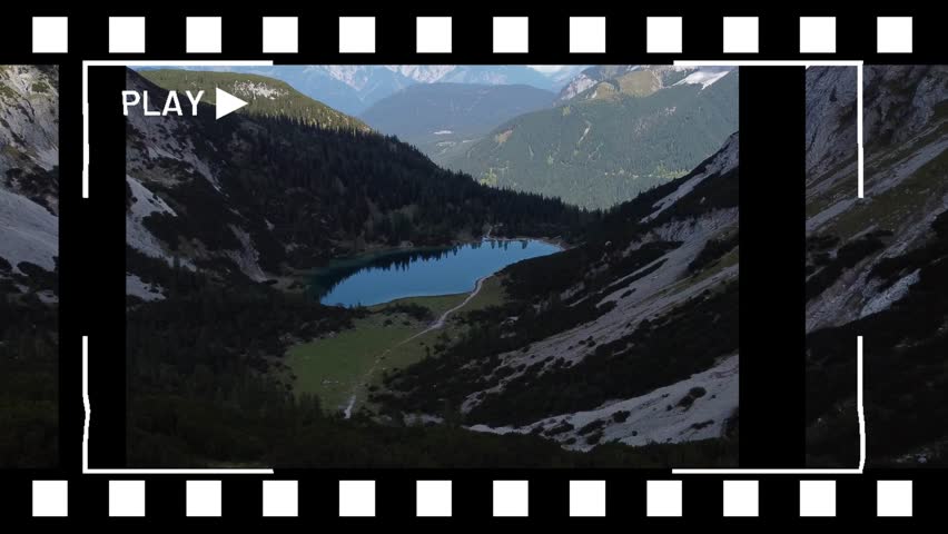 beautiful natural setting with waterfall and trees, lake and mountains