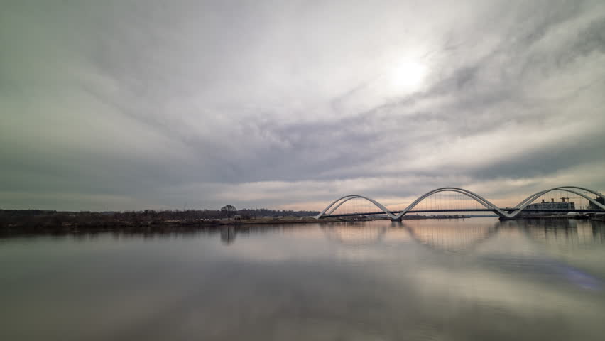 A daytime time-lapse of the Frederick Douglass Memorial Bridge in Washington, D.C. which carries South Capitol Street across the Anacostia River. The camera pans from left to right.